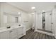 Bathroom with double vanity, large shower, and modern fixtures at 3046 Crystal Hills Dr, Lakeland, FL 33801