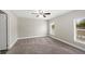 Spacious bedroom with neutral walls and carpet flooring at 3046 Crystal Hills Dr, Lakeland, FL 33801