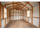 Unfinished shed interior with wood framing and flooring at 3046 Crystal Hills Dr, Lakeland, FL 33801