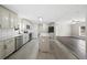 Modern kitchen with island, white cabinets, and granite countertops at 3046 Crystal Hills Dr, Lakeland, FL 33801