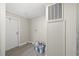 Clean laundry room with new flooring and exterior access at 3046 Crystal Hills Dr, Lakeland, FL 33801