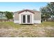 New shed with double doors in the backyard at 3046 Crystal Hills Dr, Lakeland, FL 33801