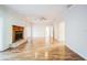 Living room with hardwood floors and a fireplace at 5325 Charlin Ave, Lakeland, FL 33810