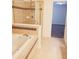 Bright bathroom features a jacuzzi tub and a large, clear shower at 745 Marsh Reed Dr, Winter Garden, FL 34787