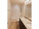 Bright bathroom features double sinks with marble countertops and a shower/tub combo at 745 Marsh Reed Dr, Winter Garden, FL 34787