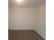 This bedroom features sleek and modern wood flooring at 745 Marsh Reed Dr, Winter Garden, FL 34787