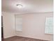 Bright living room is freshly painted and features new wood flooring and bright windows at 745 Marsh Reed Dr, Winter Garden, FL 34787