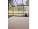 Screened patio with open views of the green lawn at 745 Marsh Reed Dr, Winter Garden, FL 34787