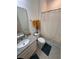 Bathroom with shower/tub combo, granite vanity, and updated fixtures at 478 Disa Dr, Davenport, FL 33837
