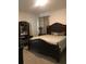Spacious bedroom with a large bed and stylish furnishings at 478 Disa Dr, Davenport, FL 33837