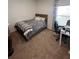 Spacious bedroom with carpeted floor, large closet, and home office area at 478 Disa Dr, Davenport, FL 33837