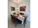 Formal dining room with wood table and fall-themed decor at 478 Disa Dr, Davenport, FL 33837
