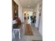 Bright and spacious foyer with tile flooring and decorative plants at 478 Disa Dr, Davenport, FL 33837