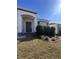 House exterior showcasing a manicured lawn and entryway at 478 Disa Dr, Davenport, FL 33837