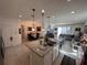 Open concept kitchen with granite countertops and island at 478 Disa Dr, Davenport, FL 33837