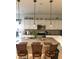 Kitchen boasts an island with seating and granite countertops at 478 Disa Dr, Davenport, FL 33837