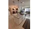 Large kitchen island with granite countertop and breakfast bar seating at 478 Disa Dr, Davenport, FL 33837