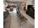 Open living room with a cozy couch and coffee table at 478 Disa Dr, Davenport, FL 33837