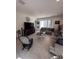 Relaxing living room with comfortable seating and large TV at 478 Disa Dr, Davenport, FL 33837