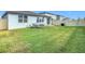 Nice backyard with patio furniture and a grill at 3052 Cassidy Ln, Haines City, FL 33844