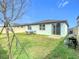 Fenced backyard with patio and grill, ready for outdoor fun at 3052 Cassidy Ln, Haines City, FL 33844