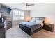 Bright bedroom with a comfortable bed and plenty of storage at 3052 Cassidy Ln, Haines City, FL 33844