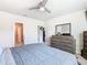 Primary bedroom with ensuite bathroom and walk-in closet at 3052 Cassidy Ln, Haines City, FL 33844