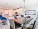 Bright kitchen features granite countertops and stainless steel appliances at 3052 Cassidy Ln, Haines City, FL 33844