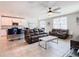 Relaxing living room with comfortable seating and a large TV at 3052 Cassidy Ln, Haines City, FL 33844