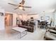 Open living room with a view of the kitchen and dining area at 3052 Cassidy Ln, Haines City, FL 33844