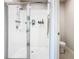 Walk-in shower with glass enclosure and tiled walls at 3052 Cassidy Ln, Haines City, FL 33844
