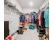 Large walk-in closet with ample shelving and hanging space at 3052 Cassidy Ln, Haines City, FL 33844
