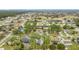 Aerial view of house and surrounding neighborhood at 2226 Baker Ave, Orlando, FL 32833