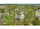 House surrounded by tall trees, aerial view of backyard at 2226 Baker Ave, Orlando, FL 32833