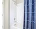 Bathroom with shower/tub and patterned shower curtain at 2226 Baker Ave, Orlando, FL 32833