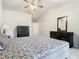 Comfortable bedroom with a king-size bed and two dressers at 2226 Baker Ave, Orlando, FL 32833