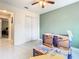 Spacious bedroom with ceiling fan and double door closet at 2226 Baker Ave, Orlando, FL 32833