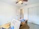 Empty bedroom with double doors and window at 2226 Baker Ave, Orlando, FL 32833