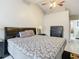 Bright bedroom featuring a king-size bed and dresser at 2226 Baker Ave, Orlando, FL 32833