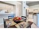 Small dining area with wood table and chairs, open to kitchen at 2226 Baker Ave, Orlando, FL 32833