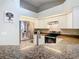 Modern kitchen with stainless steel appliances and granite countertops at 2226 Baker Ave, Orlando, FL 32833