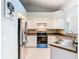 Updated kitchen, stainless steel appliances, granite counters at 2226 Baker Ave, Orlando, FL 32833