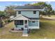 Inviting two-story home featuring a cozy screened porch and well-maintained yard at 5431 9Th Se St, Lakeland, FL 33812