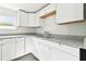 Newly renovated kitchen featuring white shaker cabinets and granite countertops at 5431 9Th Se St, Lakeland, FL 33812