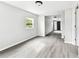 Spacious living room with modern gray flooring and fresh paint at 5431 9Th Se St, Lakeland, FL 33812