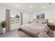 Spacious bedroom with large window and neutral color scheme at 1305 Congo Ct, Poinciana, FL 34759