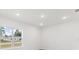 Bright bedroom with large window and neutral decor at 1305 Congo Ct, Poinciana, FL 34759