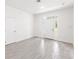 Bright entryway with gray tile floor and white walls at 1305 Congo Ct, Poinciana, FL 34759