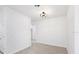 Bright hallway with tile floors and modern light fixture at 1305 Congo Ct, Poinciana, FL 34759