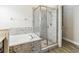 Bathroom featuring a shower and garden tub at 13212 Phoenix Dr, Orlando, FL 32828